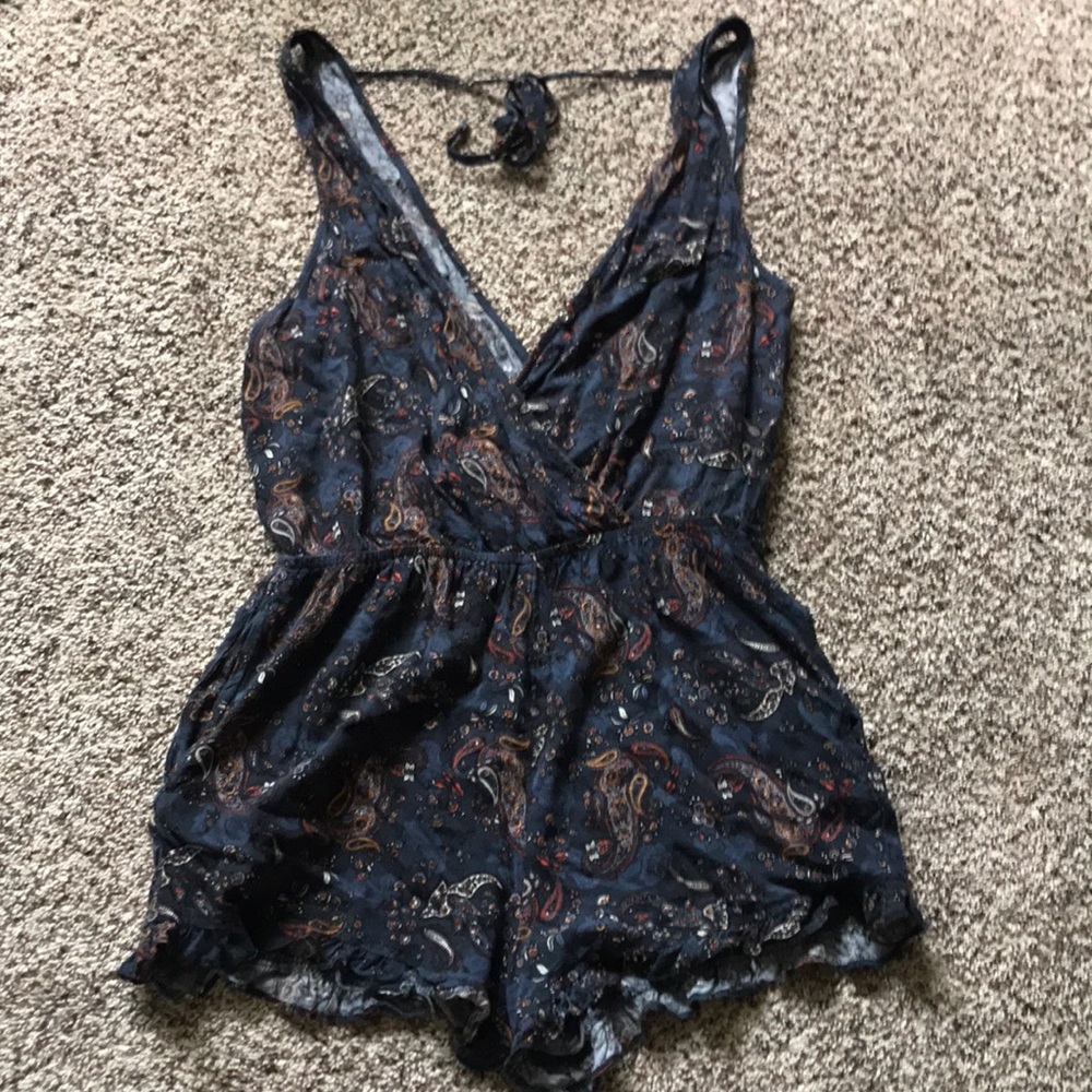 Gently used romper with details